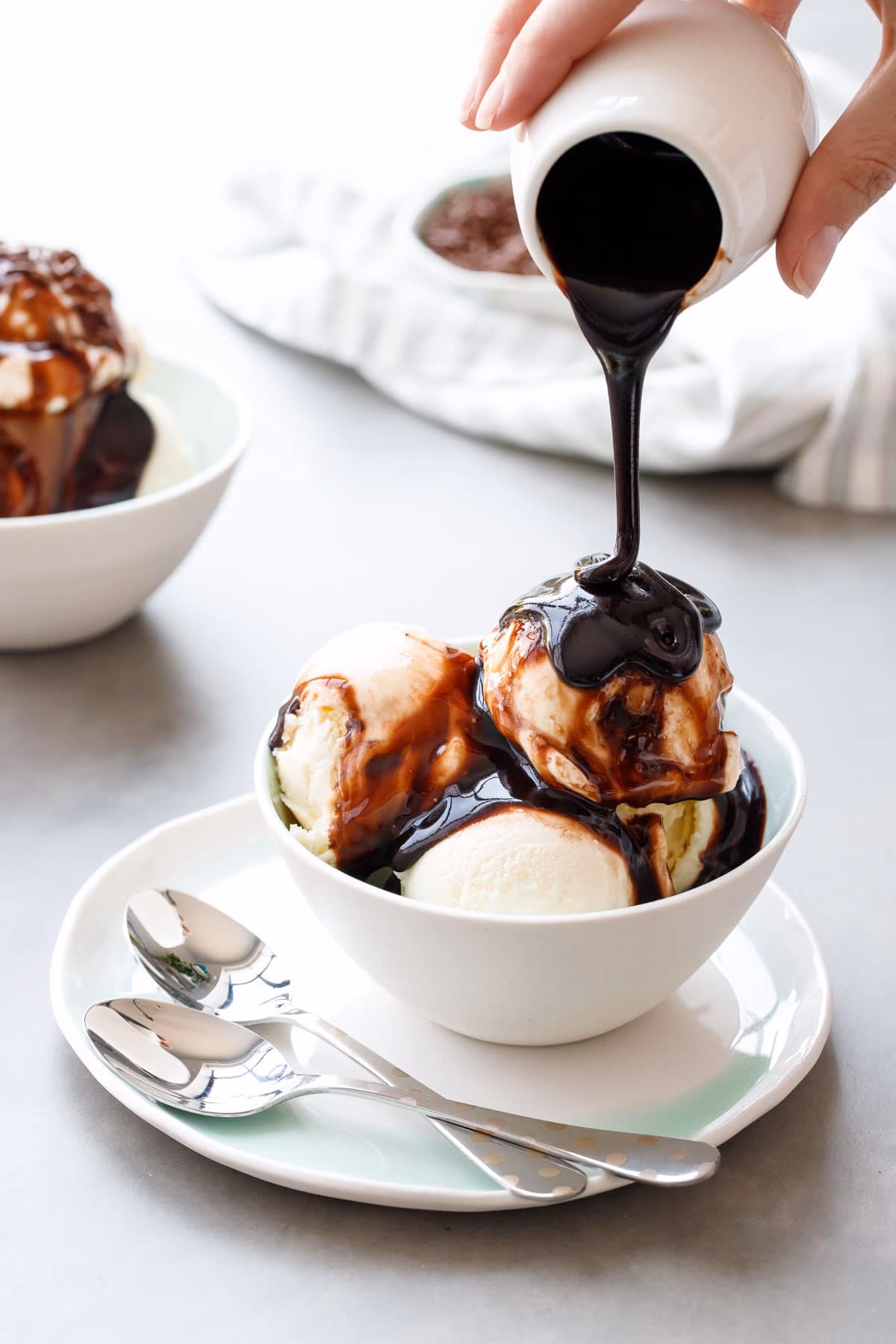 How do you rewarm hot fudge sauce?