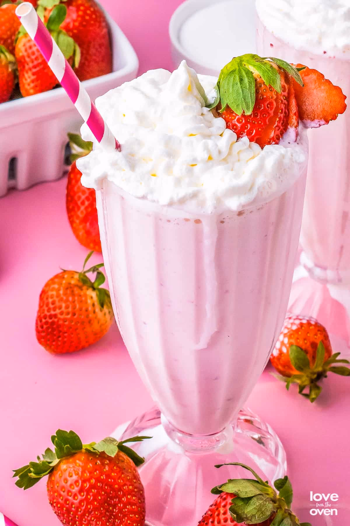 How do you make a strawberry milkshake in a blender?