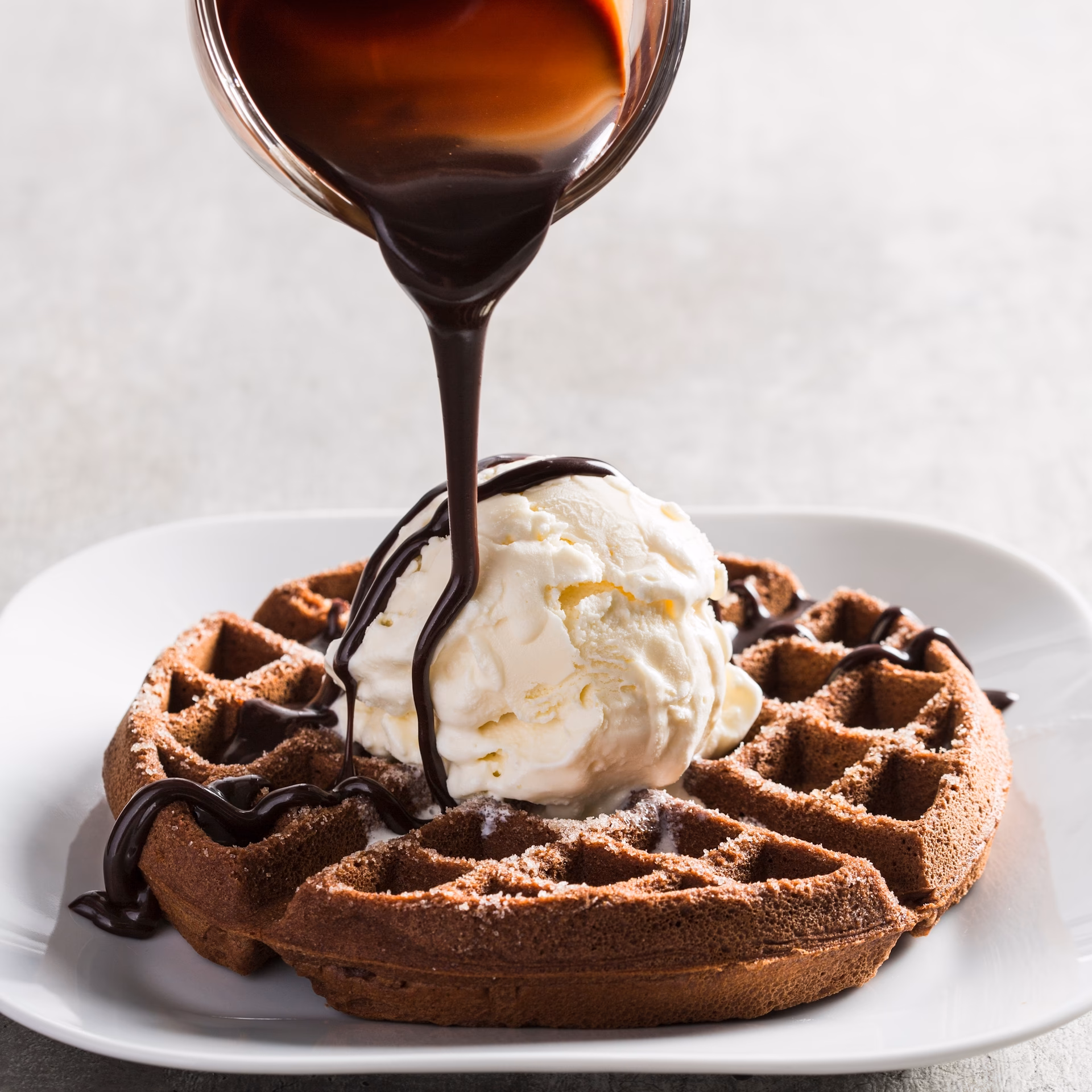 What can you add to Belgian chocolate waffles?