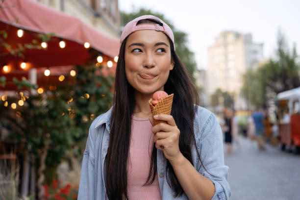 How many photos of woman eating ice cream are there?